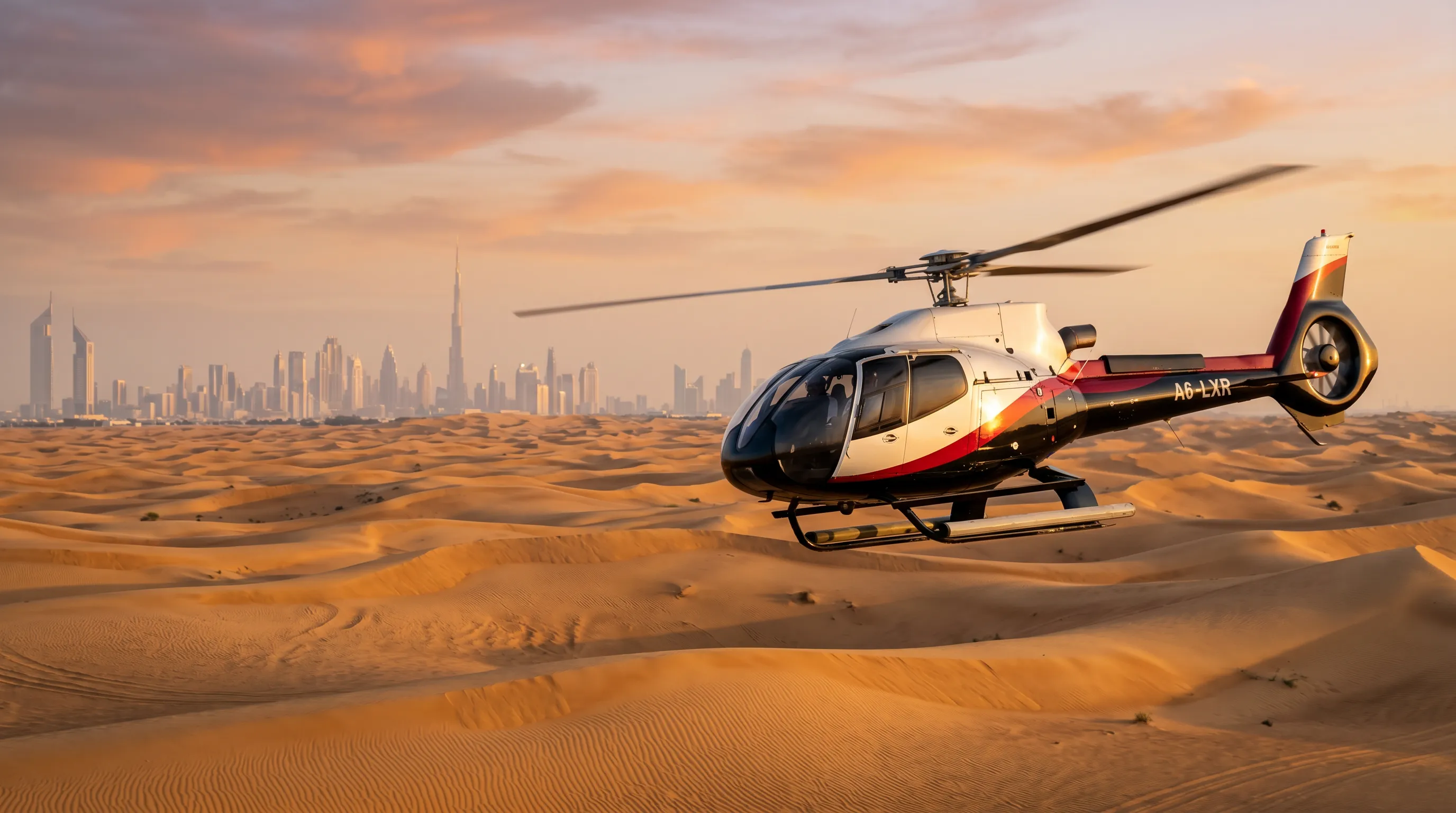 Helicopter flying low over the Dubai desert dunes