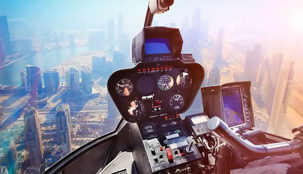 View across Business Bay from inside the helicopter cabin